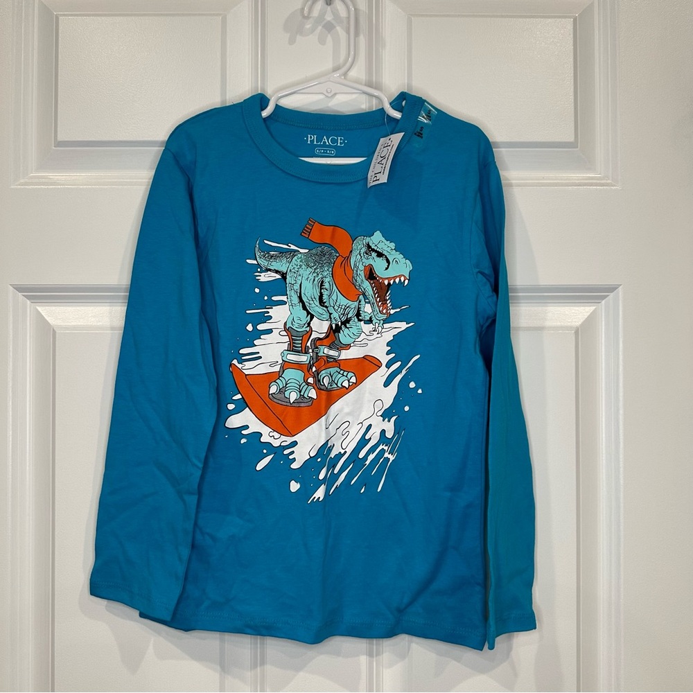 The Childrenโs Placeโ Dino Long Sleeve Size 5/6 NWT